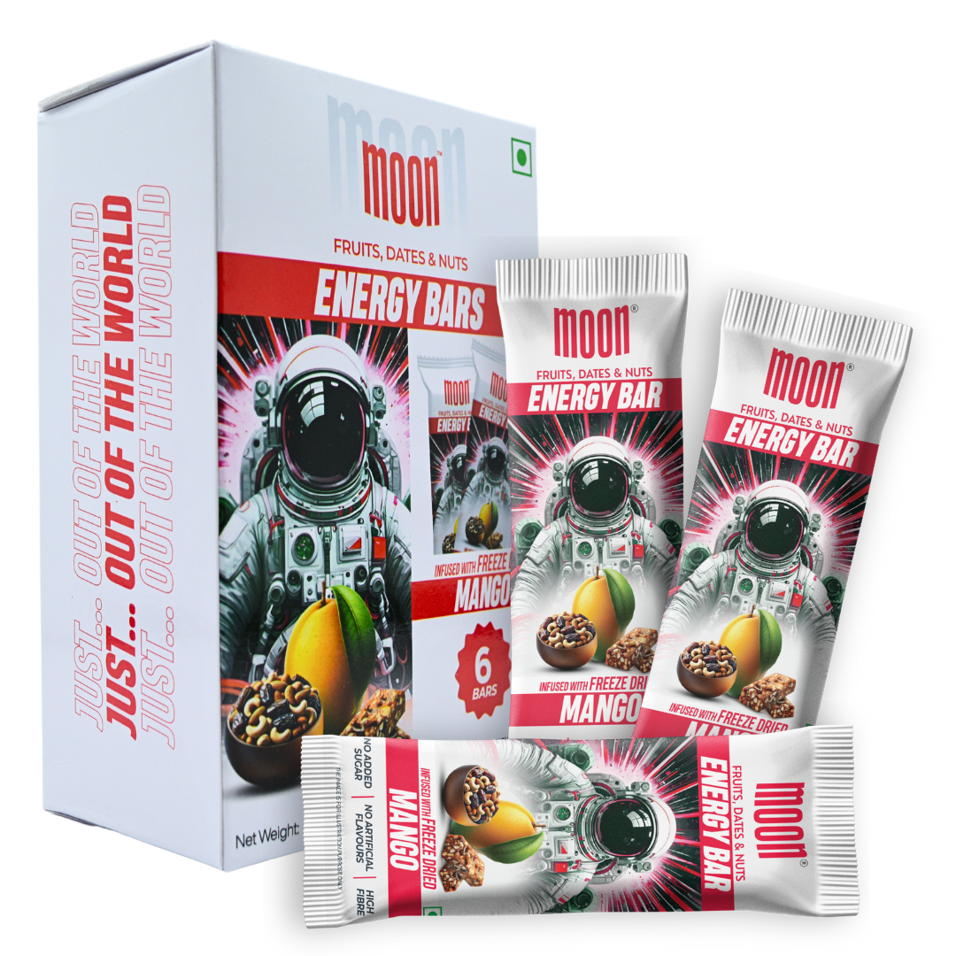 A box containing six "MOON Energy Bar - Mango" from MOONFREEZE FOODS PRIVATE LIMITED featuring an astronaut design, along with three packets of bars that mention "freeze-dried mangoes.