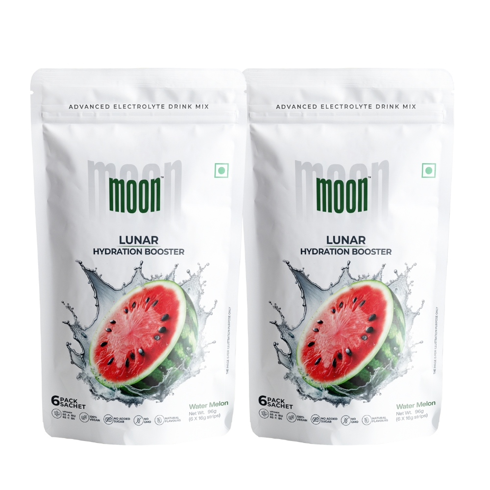 Two pouches of Moon Watermelon Lunar Hydration Booster Pack of 2, Vitamin-Infused with a watermelon flavor, depicted with a vibrant watermelon graphic splashing into water.
