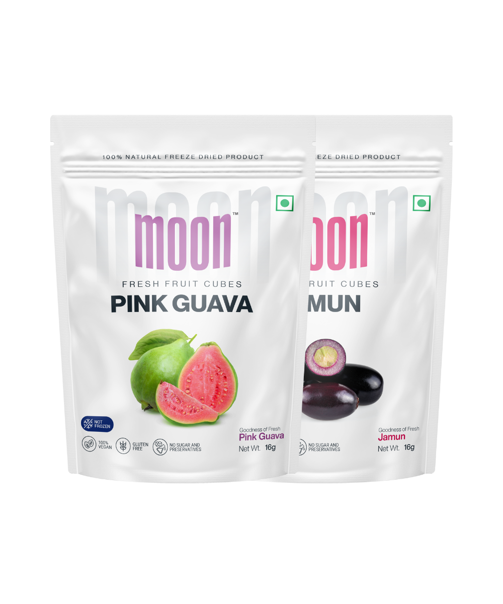 Two packages of MOONFREEZE FOODS PRIVATE LIMITED brand Moon Freeze Dried Pink Guava + Jamun Cubes, one with Moon Freeze Dried Pink Guava and the other with exotic flavors Jamun Cubes.
