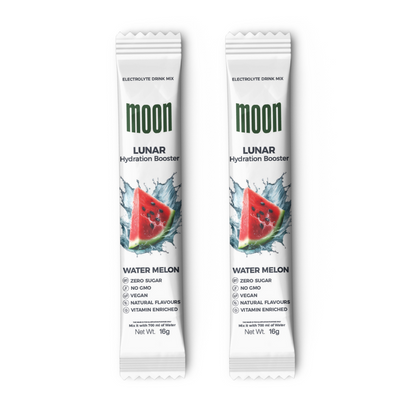 MOONFREEZE FOODS PRIVATE LIMITED's Moon Lunar Watermelon Hydration Stick Pack of 2 in watermelon flavor features a watermelon slice image and is labeled with zero sugar, non-GMO, vegan, natural flavors, and vitamin-infused. Perfect for those seeking an electrolyte-rich option to stay hydrated.