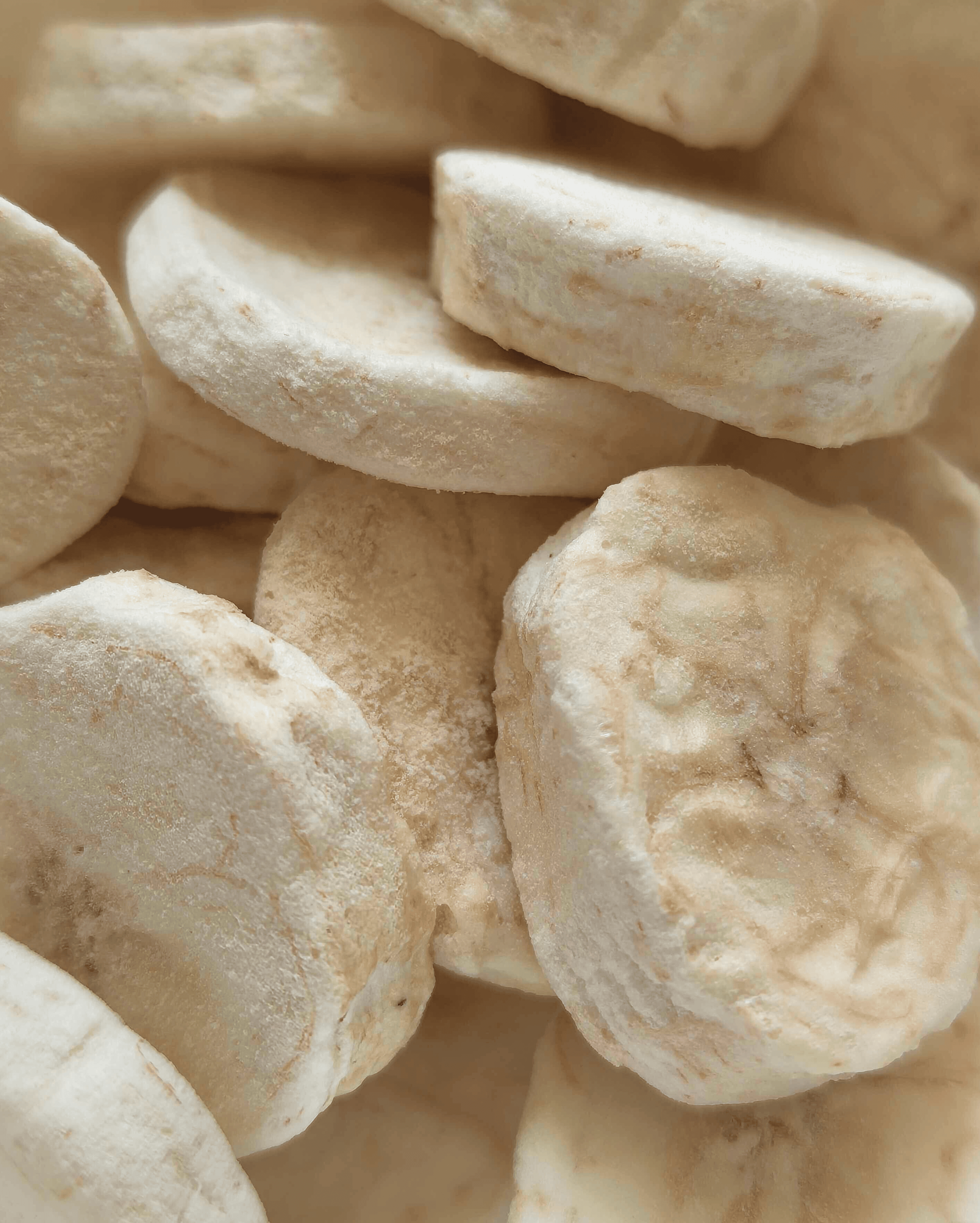 Close-up view of Freeze-Dried Banana Chips, highlighting their light, airy texture and natural appearance.