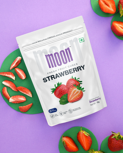A bag of Moon Freeze Dried Strawberry powder on a purple background from Themoonstoreindia.