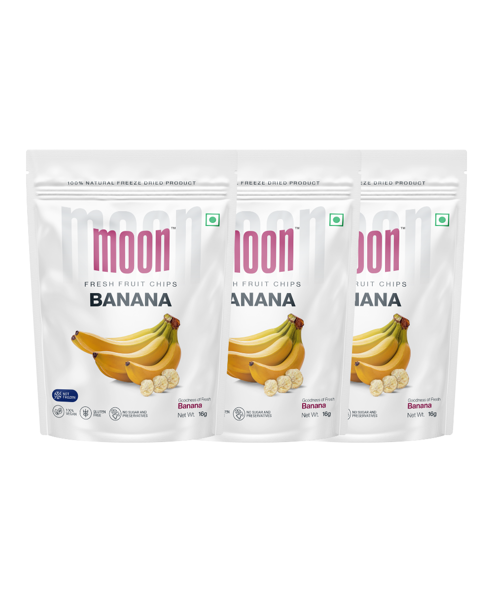 Three packages of Moon Freeze Dried Banana slices fresh fruit chips on a white background.