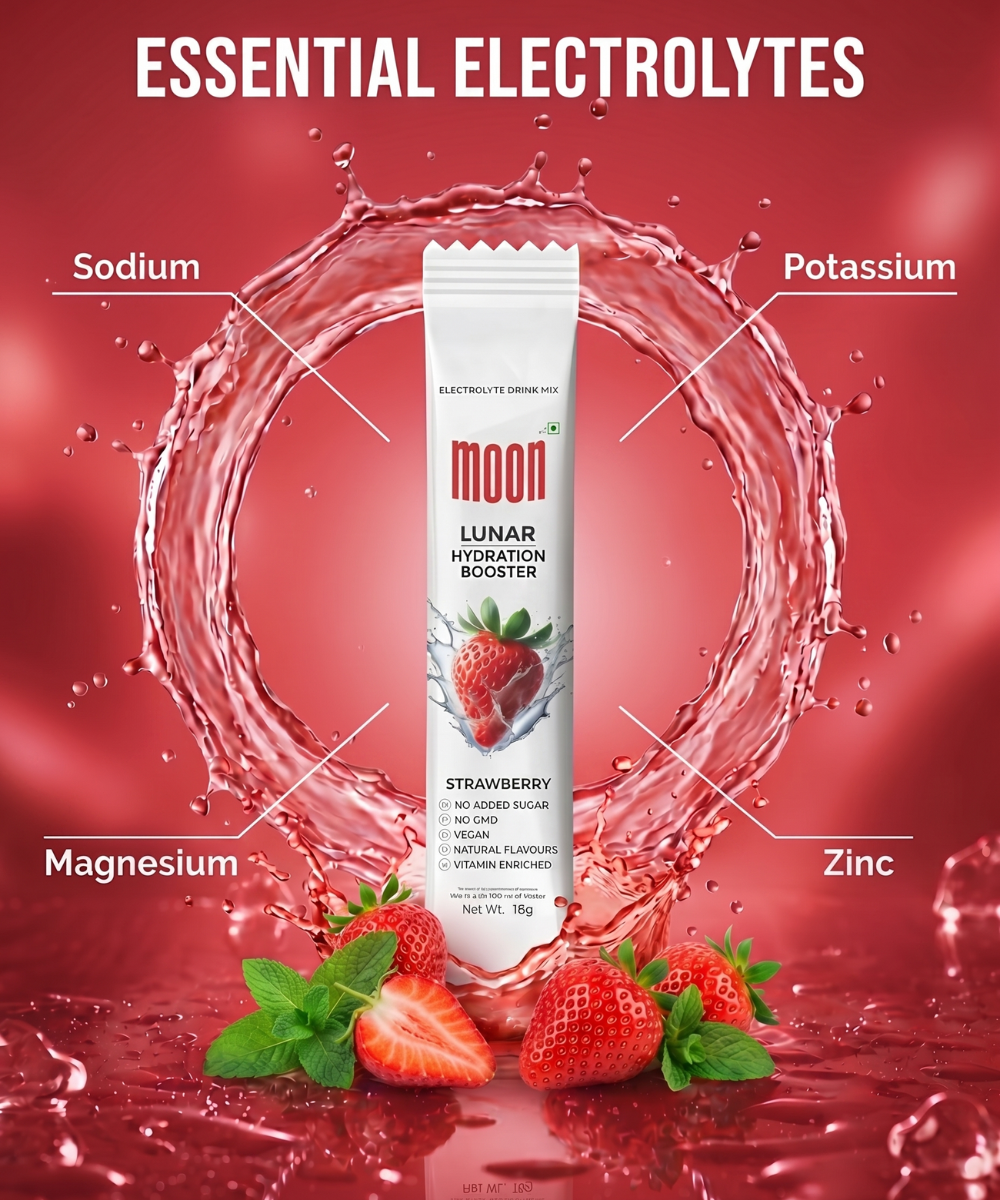 The Lunar Hydration Booster - Strawberry Flavour from MOONFREEZE FOODS PRIVATE LIMITED is surrounded by a splash of water, juicy strawberries, and labels for essential electrolytes plus a B-vitamin complex to boost your daily hydration.