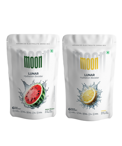Two pouches of MOONFREEZE FOODS PRIVATE LIMITED Moon Lunar Watermelon + Lemon Hydration Booster electrolyte drink mix in watermelon and lemon flavors are designed to keep you feeling invigorated and refreshed all day long. Made with real watermelon.