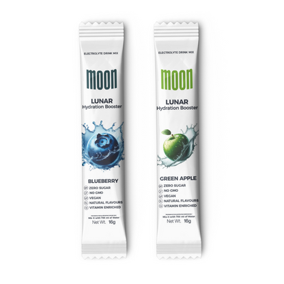 Two "Moon Lunar Blueberry and Green Apple Hydration Stick Combo" electrolyte drink mix packets, one blueberry-flavored and the other green apple-flavored, each 16g. Zero sugar, non-GMO, vegan, natural flavors, and vitamin-infused to keep you hydrated. Brand: MOONFREEZE FOODS PRIVATE LIMITED.