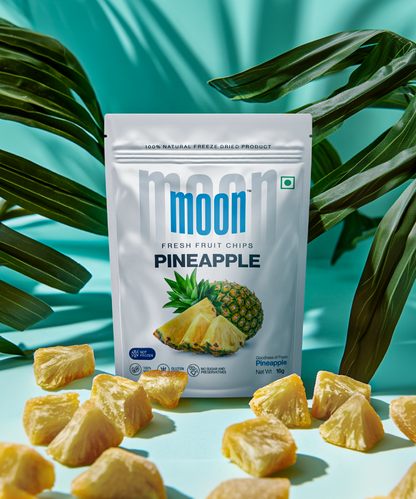 Freeze-dried Pineapple chips with fresh pineapple slices in a tropical setting.