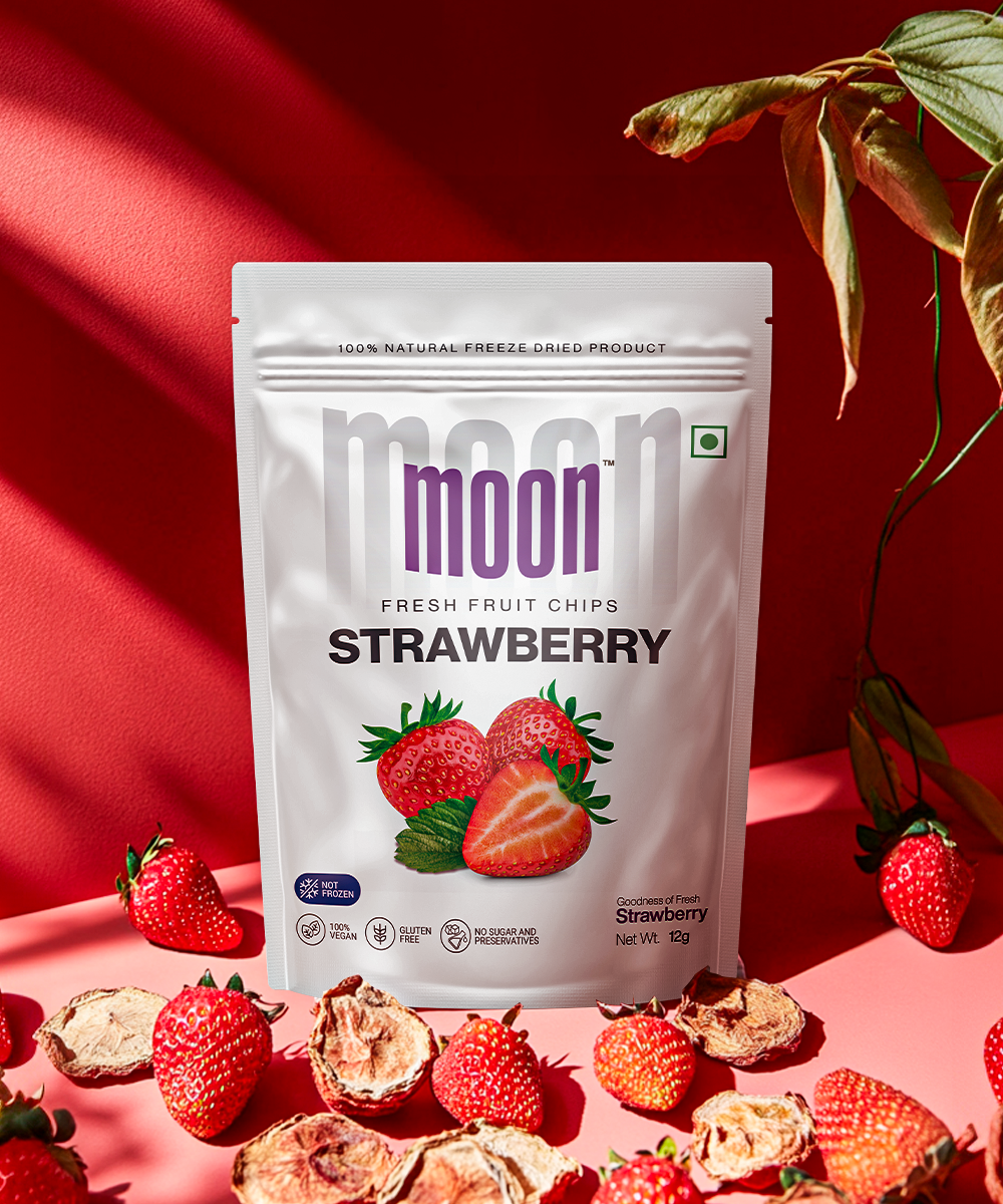 Strawberry Freeze-Dried Fruit Chips with fresh and dried strawberries on a vibrant red background.