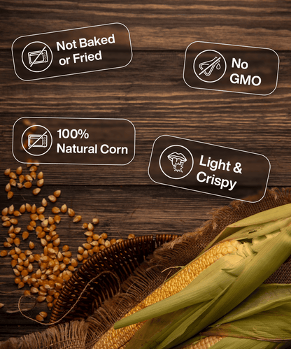 Image of corn kernels and corn cobs on a wooden surface with four labels reading: "Not Baked or Fried," "No GMO," "100% Natural Corn," and "Crispy Corn." Product Name: Freeze Dried Crispy Corn Smokey BBQ, Brand Name: MOONFREEZE FOODS PRIVATE LIMITED