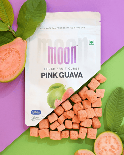 A bag of Moon Freeze Dried Pink Guava cubes, a vitamin C-rich fruit, on a colorful background, sold by Themoonstoreindia.