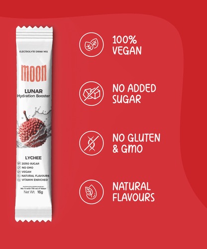 An electrolyte drink mix packet labeled "Moon Lunar Hydration Stick" in lychee flavor is shown with text emphasizing it contains crucial electrolytes, is 100% vegan, has no added sugar, is gluten and GMO-free, and boasts delicious natural flavors. The product is by MOONFREEZE FOODS PRIVATE LIMITED.